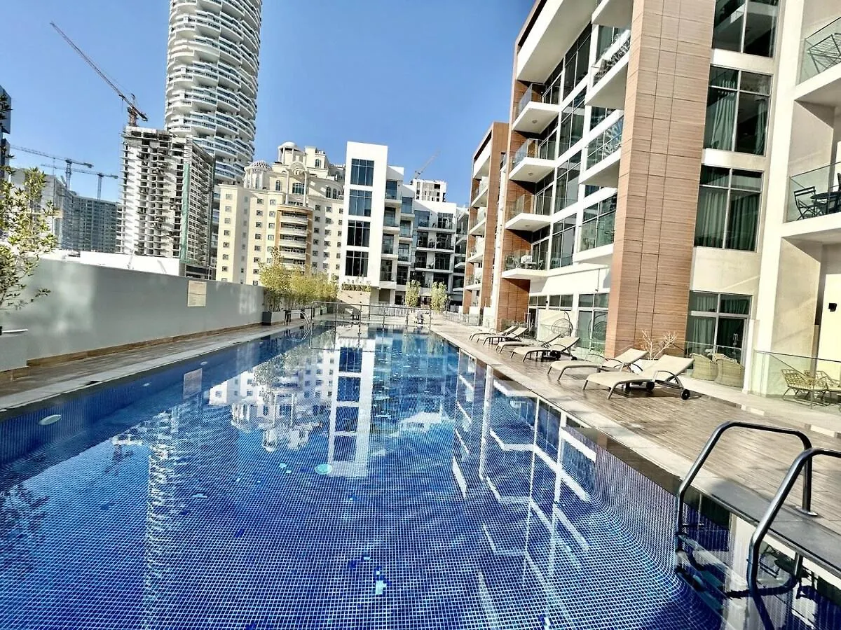 Homes2Retreat - Stylish Studio Gym & Pool, Jvc Dubai Apartment